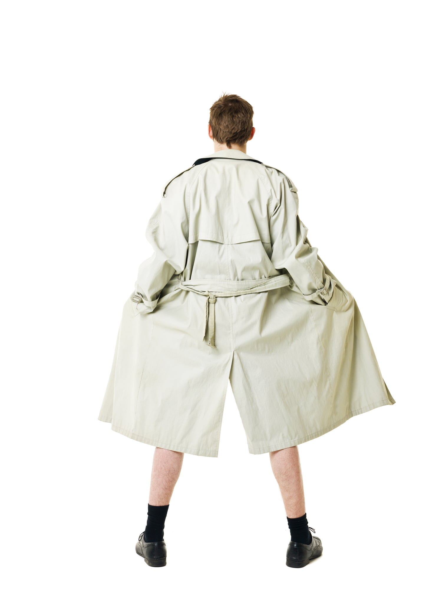 A man with an open trench coat flashes his genitals away from the camera.