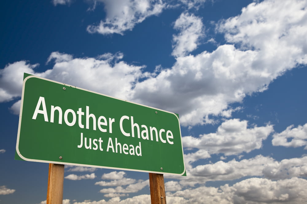 A road sign that reads "Another Chance Just Ahead" to illustrate california criminal diversion programs